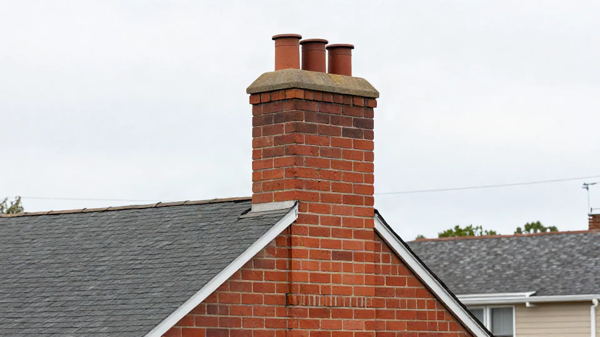 Brick chimney on a home served by FJ & Sons Chimney Sweep in Washington, DC